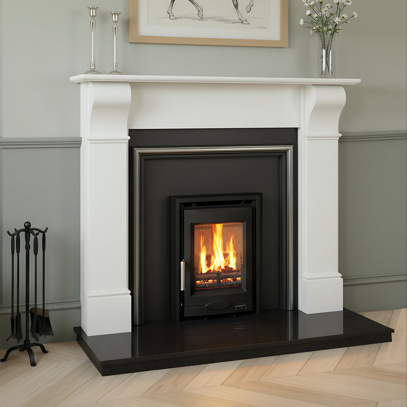 Fireplace with a lit fire, mantel with decor items, and horse artwork on a gray wall.
