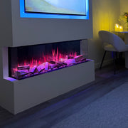 Modern living room with a fireplace and wall-mounted TV displaying a scenic image.
