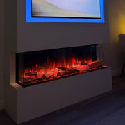 Modern electric fireplace with a mounted TV displaying a scenic image.