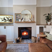 black Multifuel Woodburning Stove in living room 