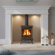 Mazona freestanding stove in marble white fireplace. 