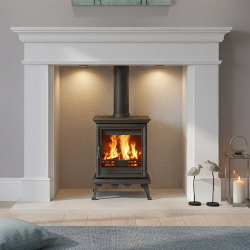 Mazona freestanding stove in marble white fireplace. 