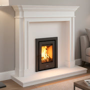 Modern fireplace with white mantel in a living room setting
