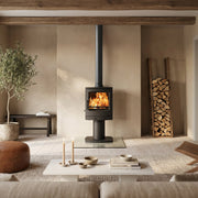 Modern living room with a fireplace, wooden chair, and potted plant.