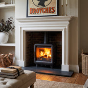 Art deco freestanding stove in marble surround 