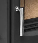Metal handle on a cabinet door with a cork background