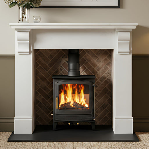 marble fireplace surround with traditional woodburning stove 