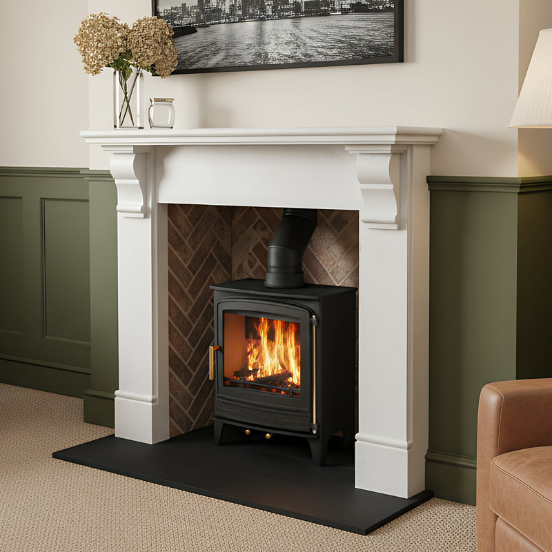 Woodburning stove in marble fireplace 