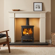 mazona woodburning multifuel stove in a marble surround. Cosy living room 