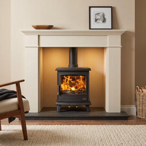 mazona woodburning multifuel stove in a marble surround. Cosy living room 