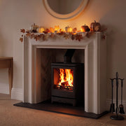 Cosy autumn living room with mazona woodburning stove alight 