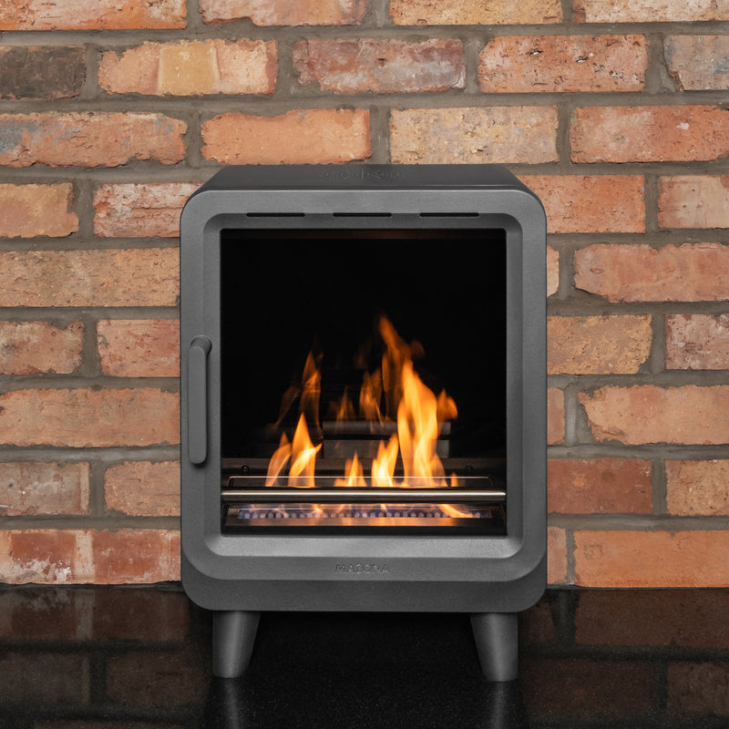 Mazona heatwave stove with flame and red brick wall 