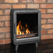 Mazona heatwave stove with flame and red brick wall 