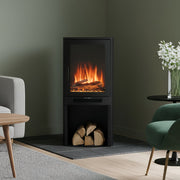 Modern electric fireplace with logs in a living room setting.