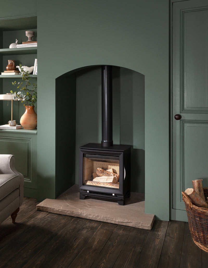 feet extender for a multifuel stove, stove in living room 